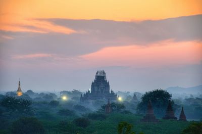 View of temple against sky during sunset