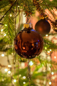 Close-up of christmas decoration hanging on tree