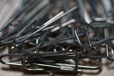 Close-up of paper clip on table