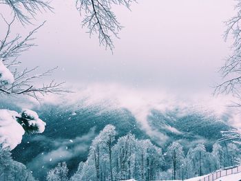 Scenic view of frozen lake against sky during winter