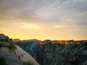 Scenic view of mountains against sky during sunset