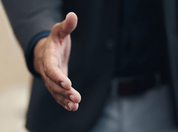 Cropped hand of woman holding hands