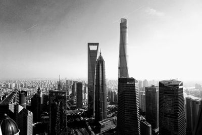 Modern buildings in city against sky