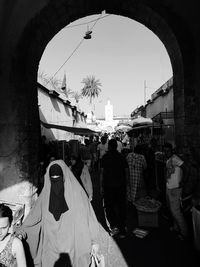 View of people walking on tiled floor