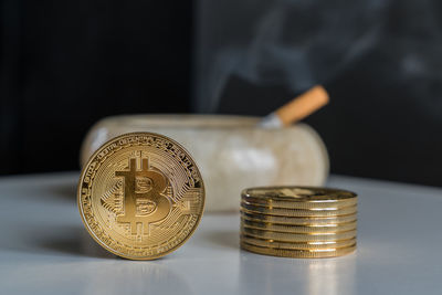 Close-up of coins on table