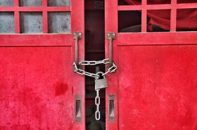 Closed red door of shrine