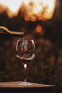 Close-up of wineglass on table