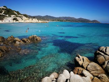 Scenic view of sea against clear blue sky