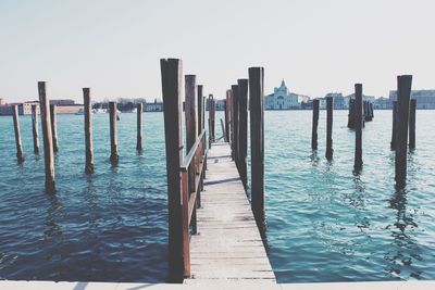 Wooden jetty leading to sea