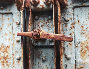 Close-up of old rusty metal door