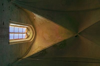 Low angle view of glass window in building