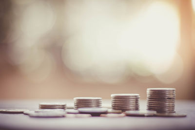 Close-up of coins on table