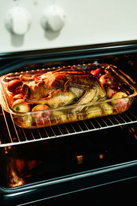 High angle view of meat in cooking pan