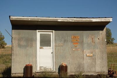 Abandoned building against clear sky