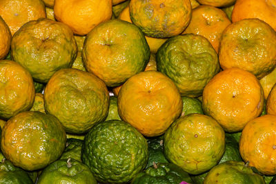 Full frame shot of oranges in market