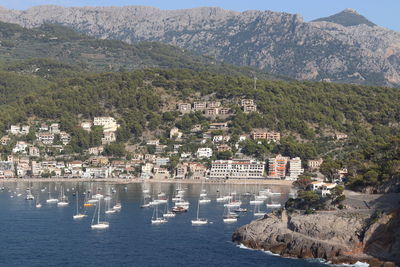 High angle view of townscape and mountains in town
