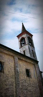 Low angle view of old building against sky