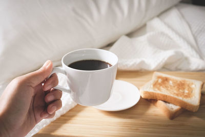 Midsection of coffee cup