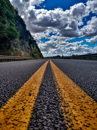 Surface level of road against sky