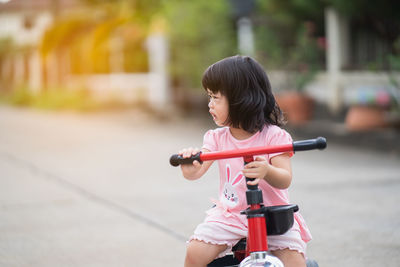 Girl riding bicycle