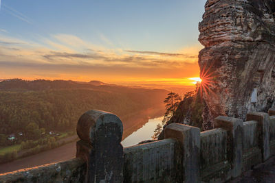 Scenic view of mountains against sky during sunset