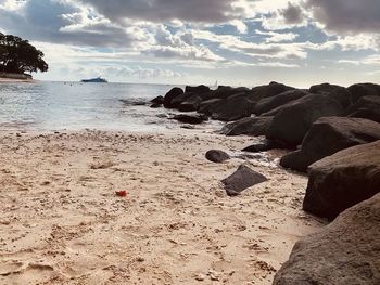 Scenic view of beach against sky