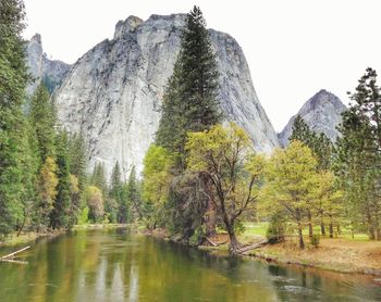 Scenic view of lake with mountains in background