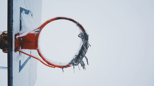 Close-up of basketball hoop against clear sky