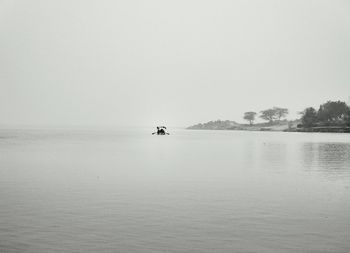 Boat sailing in sea