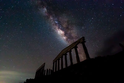 Low angle view of old ruins at night