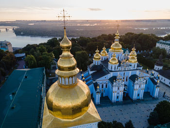 Panoramic view of temple and building against sky