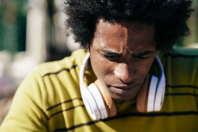 Close-up of man looking down