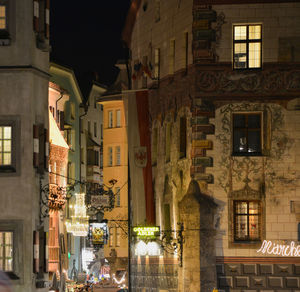 Buildings in city at night