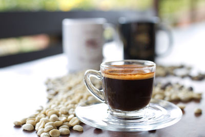 Close-up of coffee cup on table