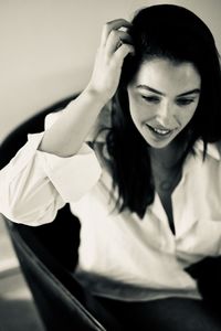 Portrait of young woman looking away