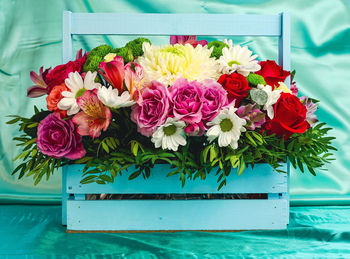 Close-up of pink flowers on table