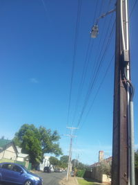 Cars on road against sky