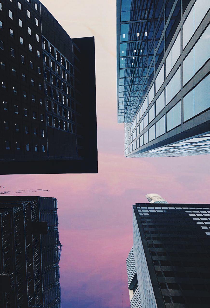 LOW ANGLE VIEW OF SKYSCRAPERS AGAINST SKY