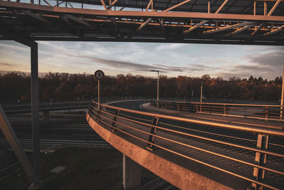 Empty railroad station platform against sky