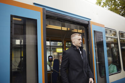 Man leaving bus