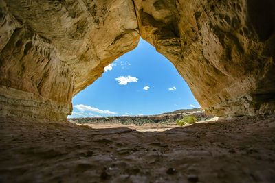 Blue sky seen from cave in desert