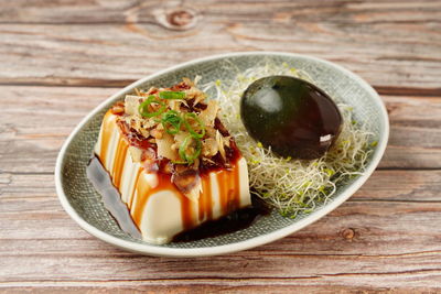 High angle view of ice cream in bowl on table