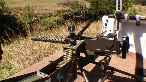 Close-up of machinery on field