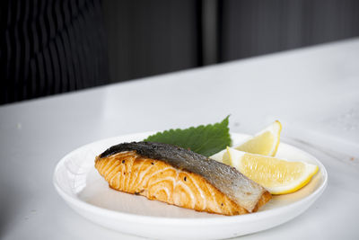 Close-up of sushi in plate on table