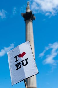 Close-up of i love europe sign in front of column