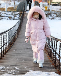 Full length of woman walking on pier