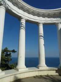 Low angle view of building against clear blue sky