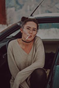 Portrait of woman in car