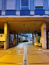 Empty road with bridge in background