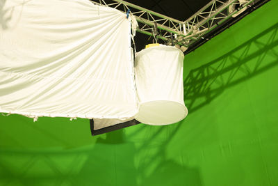 Close-up of tent hanging by swimming pool